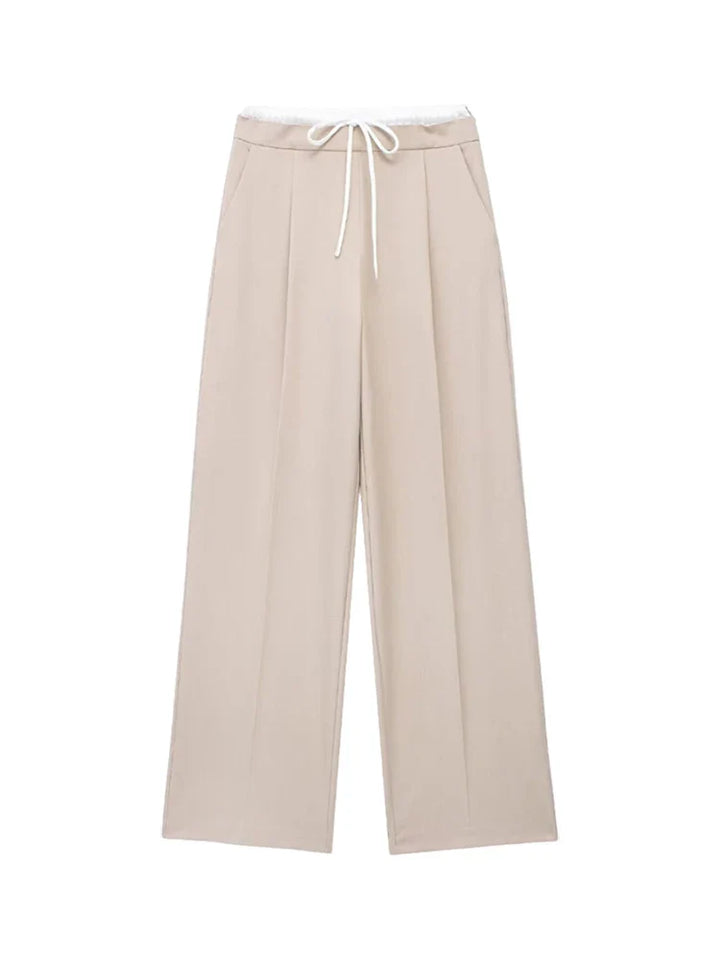 Wide trousers with double waistband