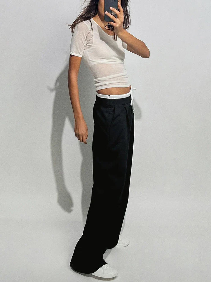 Wide trousers with double waistband